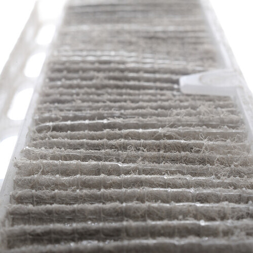 closeup very dirty air conditioner filter